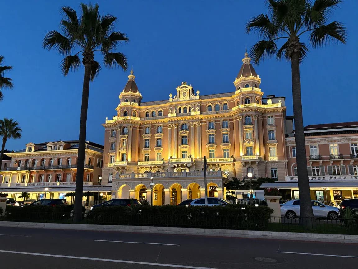 The Croisette in Cannes at dawn, palm trees and hotel façades